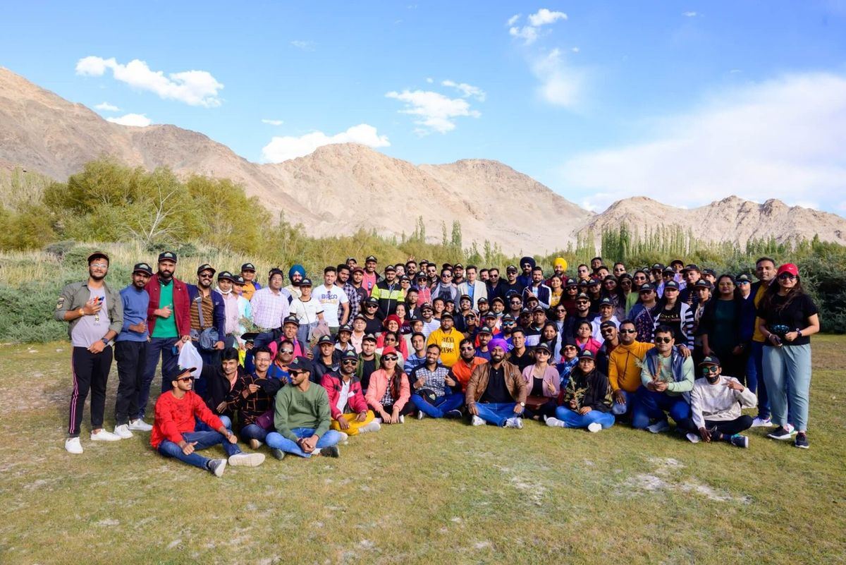 A large gathering in Leh, Ladakh, with the Himalaya behind